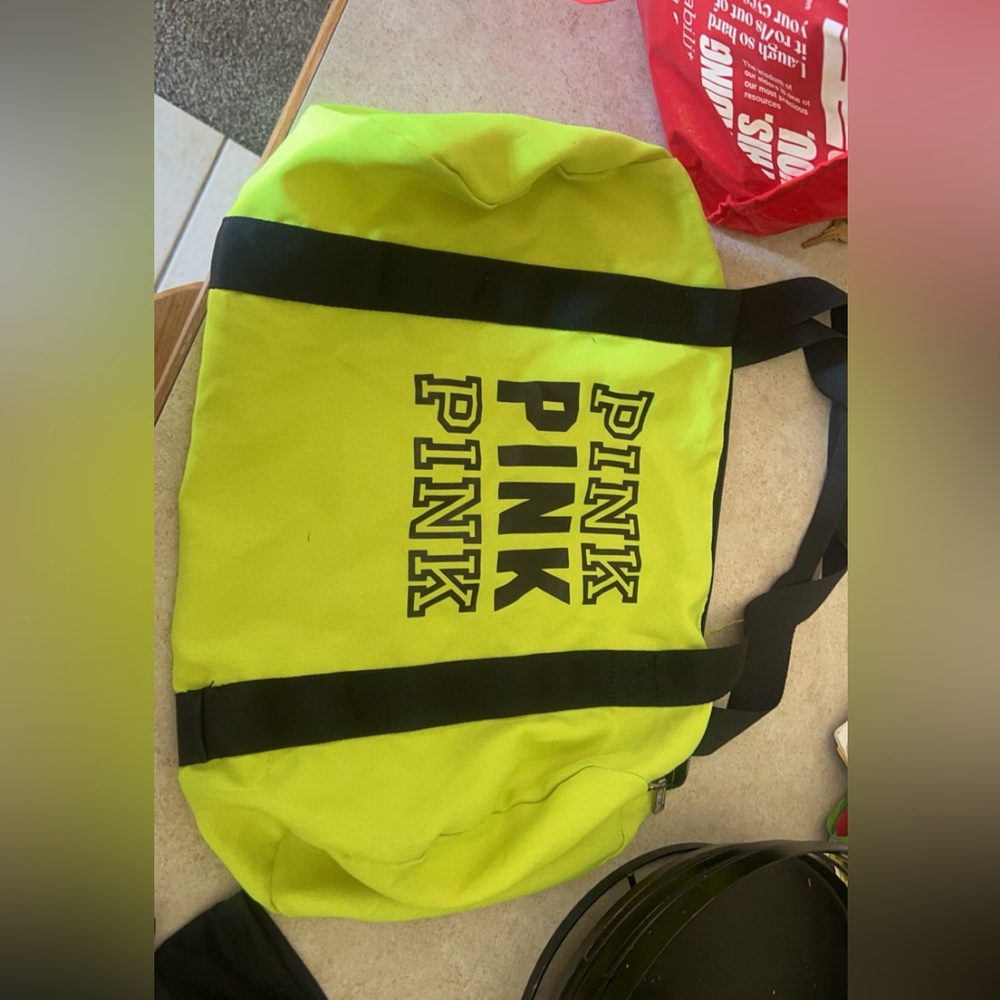 Neon yellow Victoria’s secret pink duffle bag